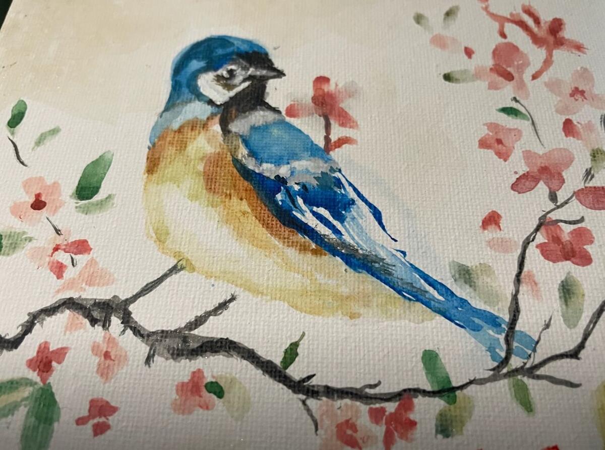 Watercolor of a small blue and peach bird perched on a dark branch among pink blossoms, by Barbara Ballard