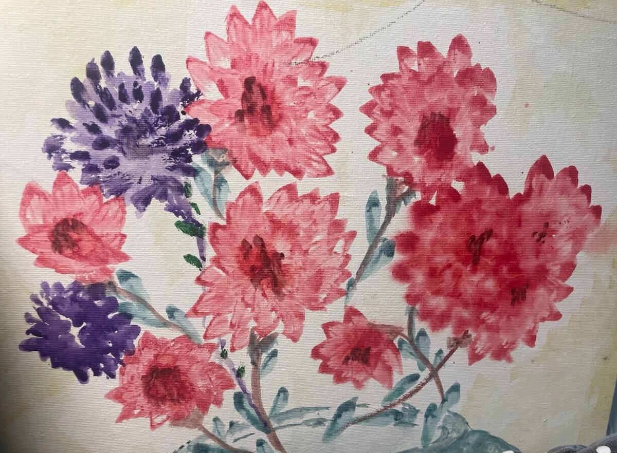Watercolor of spiky pink and crimson dahlias with violet blooms on green stems above a pale vase, by Barbara Ballard