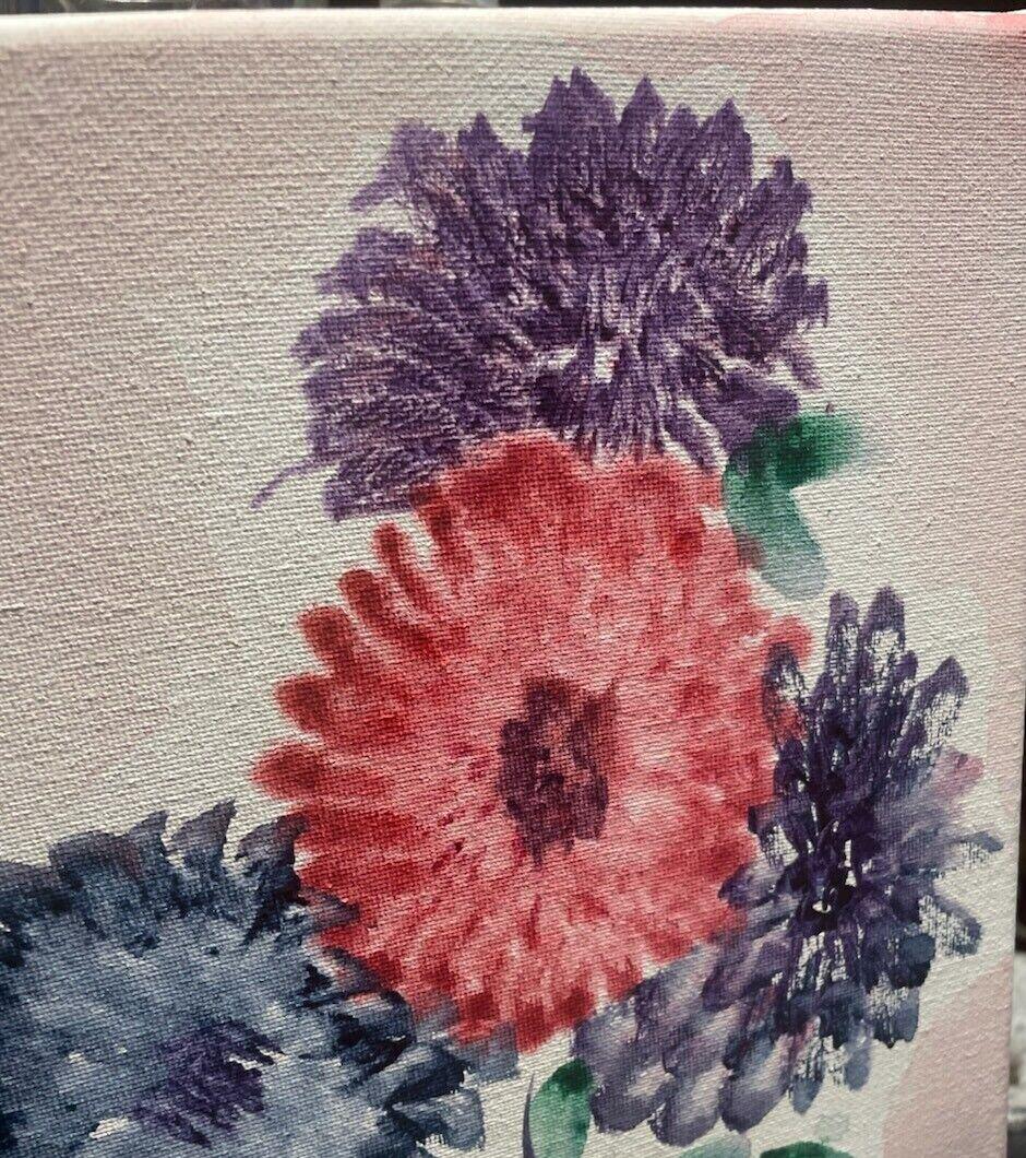 Watercolor on canvas of a coral-red flower between violet and slate-blue flowers with green leaves on a pale pink background, by Barbara Ballard
