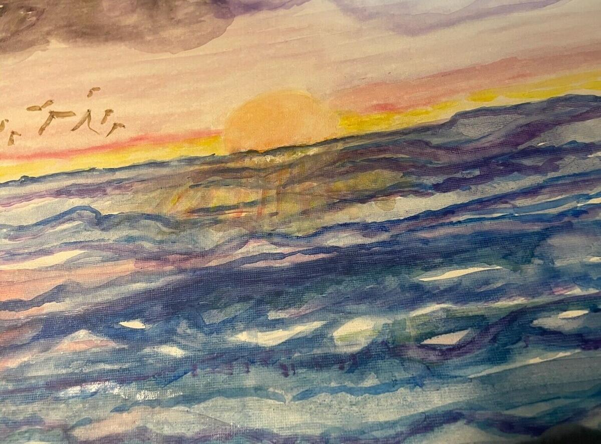Watercolor of a peach sun setting over blue and violet waves beneath a pink and lavender sky with a flock of birds, by Barbara Ballard
