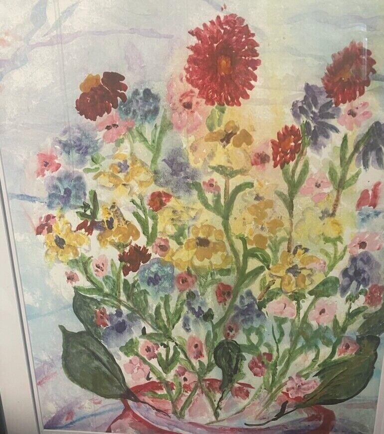 Watercolor of a full bouquet of red, yellow, pink, blue and violet wildflowers with green leaves in a red pot, against a pale blue background, by Barbara Ballard